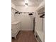 Well-organized walk-in closet featuring custom built-ins and hardwood floors at 558 Pendleton Dr, Moncks Corner, SC 29461