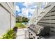 Backyard featuring an outdoor grill and in-ground pool with lush landscaping at 566 Wading Pl, Daniel Island, SC 29492