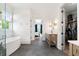 Bright bathroom featuring a soaking tub, natural light and modern fixtures at 566 Wading Pl, Daniel Island, SC 29492