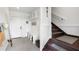 Welcoming entryway with coat rack, staircase, bench seating, and storage, providing practical space at 566 Wading Pl, Daniel Island, SC 29492