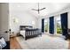Bright, spacious main bedroom with hardwood floors and lots of natural light at 566 Wading Pl, Daniel Island, SC 29492