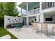 Relaxing outdoor living space with comfortable seating, outdoor bar, and stylish decor at 566 Wading Pl, Daniel Island, SC 29492