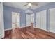 This bedroom has hardwood floors, good closet space, and multiple access doors at 700 Daniel Ellis Dr # 3108, Charleston, SC 29412