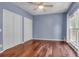 Bedroom boasts hardwood floors, natural light, and double closets for ample storage at 700 Daniel Ellis Dr # 3108, Charleston, SC 29412