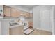 Bright kitchen features tile floor, white appliances, and modern countertops at 700 Daniel Ellis Dr # 3108, Charleston, SC 29412