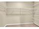 Spacious walk-in closet with multiple shelves provides ample storage space at 700 Daniel Ellis Dr # 3108, Charleston, SC 29412