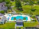 Stunning aerial of pool, golf course, and tennis courts in amenity-rich community at 704 Kilarney Rd, Summerville, SC 29483