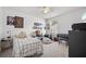 Bedroom with neutral carpet, a unique guitar display, a bed and tv at 704 Kilarney Rd, Summerville, SC 29483