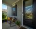 Cozy front porch featuring comfortable seating and charming decor, creating an inviting entrance at 704 Kilarney Rd, Summerville, SC 29483