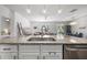 Modern kitchen with granite countertops and an open floor plan to the living areas at 704 Kilarney Rd, Summerville, SC 29483