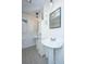 Elegant bathroom with dual pedestal sinks and modern lighting fixtures at 734 Waterloo St, Charleston, SC 29412