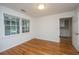 Bright bedroom with hardwood floors and large windows offers natural light at 734 Waterloo St, Charleston, SC 29412