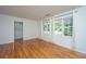 Airy living room with hardwood floors, bright windows, and neutral walls offering versatility at 734 Waterloo St, Charleston, SC 29412