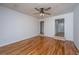 Spacious living room boasts hardwood floors and a modern ceiling fan at 734 Waterloo St, Charleston, SC 29412