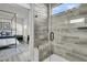 Luxurious bathroom featuring a tiled shower with a glass door, offering a spa-like experience at 753 Blue Iris Way, Summerville, SC 29486