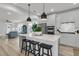 Open-concept kitchen with a large island and seating, perfect for entertaining at 753 Blue Iris Way, Summerville, SC 29486