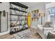 Stylish display featuring a surfboard and nautical decor at 753 Blue Iris Way, Summerville, SC 29486