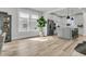 Open concept living area with seamless flow to the modern kitchen at 753 Blue Iris Way, Summerville, SC 29486