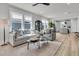 Bright living room with lots of natural light and neutral decor at 753 Blue Iris Way, Summerville, SC 29486