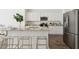 Bright kitchen with white cabinets, stainless steel appliances, and a large center island at 8712 Silver Perch Ln, North Charleston, SC 29420