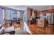 Open-concept dining area featuring hardwood floors, modern lighting, and a sliding glass door for natural light at 9024 Parlor Dr, Ladson, SC 29456