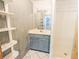 Bathroom with vanity, mirror, tile floor and walk-in shower at 93 Knights Ave, Walterboro, SC 29488