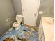 Bathroom featuring a toilet, sink, and updated vanity at 93 Knights Ave, Walterboro, SC 29488