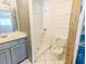 Bathroom with vanity, mirror, walk-in shower and toilet at 93 Knights Ave, Walterboro, SC 29488