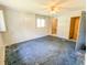 Bedroom featuring a window, ceiling fan and doorway at 93 Knights Ave, Walterboro, SC 29488