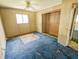 Bedroom with a window, closet, and ceiling fan at 93 Knights Ave, Walterboro, SC 29488