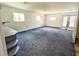 View of the living room with bright light, multiple windows, and open floor plan at 93 Knights Ave, Walterboro, SC 29488
