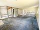 Bright living area with open layout, shelving and doorway leading to other rooms at 93 Knights Ave, Walterboro, SC 29488
