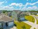 Aerial view of a well-planned community showcasing a lovely two-story home with a two-car garage at 1032 Peridote Way, Ladson, SC 29456