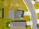 Overhead aerial perspective showing home with its roof, lawn and driveway as part of a well-planned neighborhood at 1032 Peridote Way, Ladson, SC 29456
