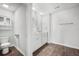Well-lit bathroom featuring double sinks, white cabinets, and modern fixtures at 1032 Peridote Way, Ladson, SC 29456