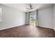 Spacious bedroom features a modern ceiling fan and access to a backyard patio at 1032 Peridote Way, Ladson, SC 29456