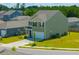 Charming two-story house with a well-maintained lawn and inviting curb appeal in a neighborhood setting at 1032 Peridote Way, Ladson, SC 29456