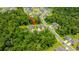 Aerial view of a neighborhood with wooded areas and well-maintained homes at 104 Limpkin Ln, Summerville, SC 29483