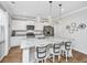 Bright kitchen with stainless steel appliances, granite countertops, and pendant lighting at 104 Limpkin Ln, Summerville, SC 29483