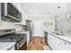 Well-lit kitchen featuring stainless steel appliances and subway tile backsplash at 104 Limpkin Ln, Summerville, SC 29483