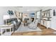 Comfortable living room featuring hardwood floors, fireplace, and stylish decor at 104 Limpkin Ln, Summerville, SC 29483