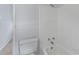 Clean bathroom features a shower-tub combination with white tile surround and neutral decor at 107 Hickory Ln # C, Ladson, SC 29456