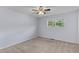 Neutral bedroom with a ceiling fan, a window with view of yard, and plush carpet at 107 Hickory Ln # C, Ladson, SC 29456