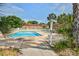 Community pool area featuring palm trees and comfortable lounging space at 107 Hickory Ln # C, Ladson, SC 29456