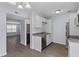 Efficient kitchen layout featuring stainless steel appliances, ample cabinet space, and durable laminate flooring at 107 Hickory Ln # C, Ladson, SC 29456