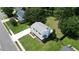 Aerial view of freshly renovated home with a long driveway and mature trees at 107 Sugarpine Pl, Summerville, SC 29486