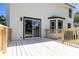 Rear exterior featuring a spacious backyard deck perfect for entertaining at 107 Sugarpine Pl, Summerville, SC 29486