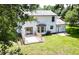 Aerial view of home with wooden deck and lush green yard at 107 Sugarpine Pl, Summerville, SC 29486