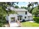 Aerial view of home with wooden deck and lush green yard at 107 Sugarpine Pl, Summerville, SC 29486