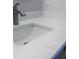 Up-close view of a bathroom featuring a sleek faucet and quartz countertops at 107 Sugarpine Pl, Summerville, SC 29486